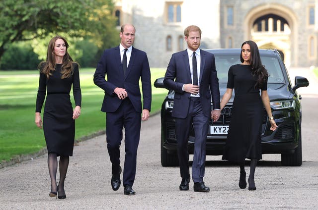 The Waleses and the Sussexes prepare to greet mourners outside Windsor Castle in 2022 