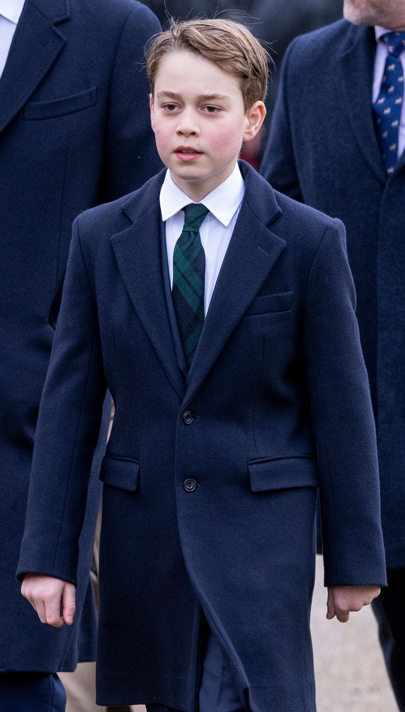 Image may contain Prince George of Cambridge Clothing Formal Wear Suit Coat Accessories Tie Blazer Jacket and Adult