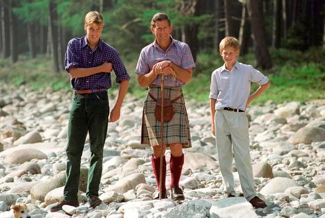 Getty Prince William, Prince Charles, and Prince Harry at Balmoral on August 12, 1997