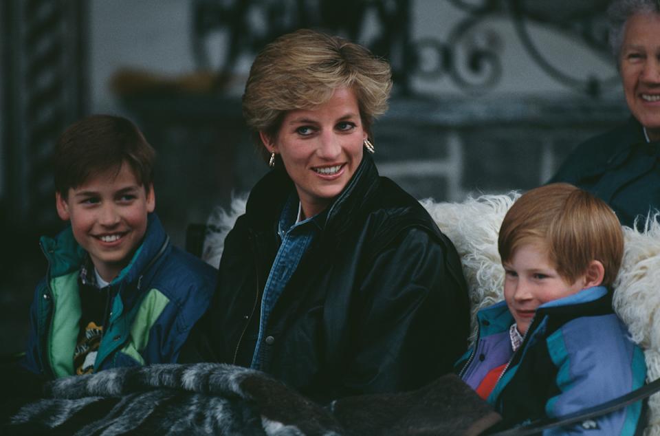 Diana, Princess of Wales, with Prince William (left) and Prince Harry (right) during a skiing holiday in Lech, Austria, on March 30, 1993. / Princess Diana Archive / Getty Images