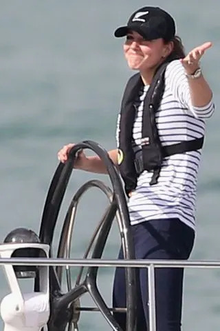 Chris Jackson/Getty Kate Middleton shrugs after winning a yacht race against husband Prince William in Auckland, New Zealand, on April 11, 2014