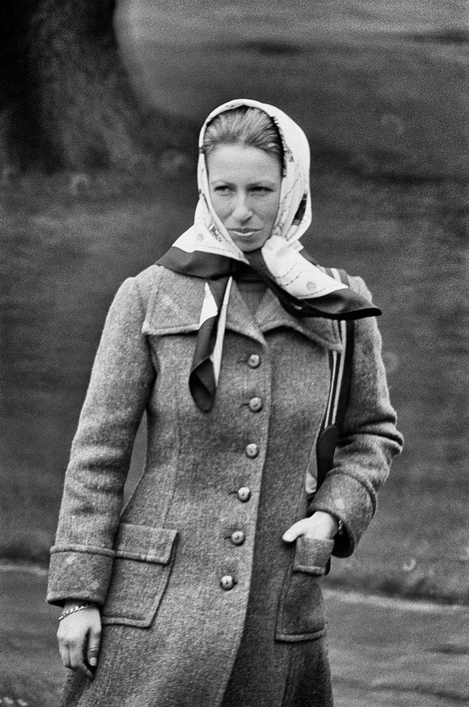 windsor, england circa 1978: princess anne, princess royal pictured at the windsor horse show wearing a buttoned single breasted tweed coat with flap pockets and a silk headscarf. (photo by derek hudson/getty images)