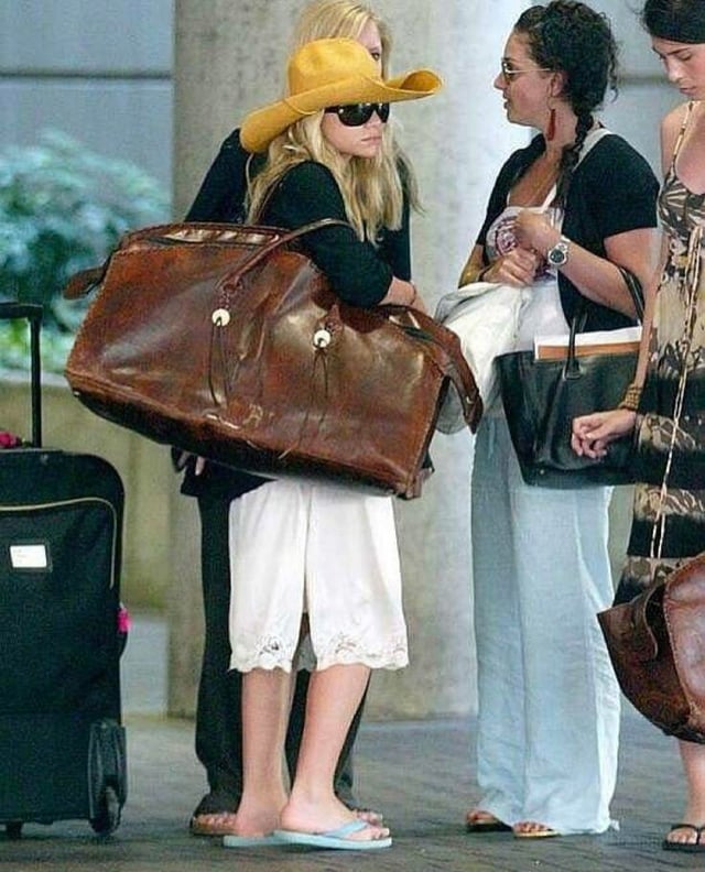 Celebs wearing ludicrously capacious bags.