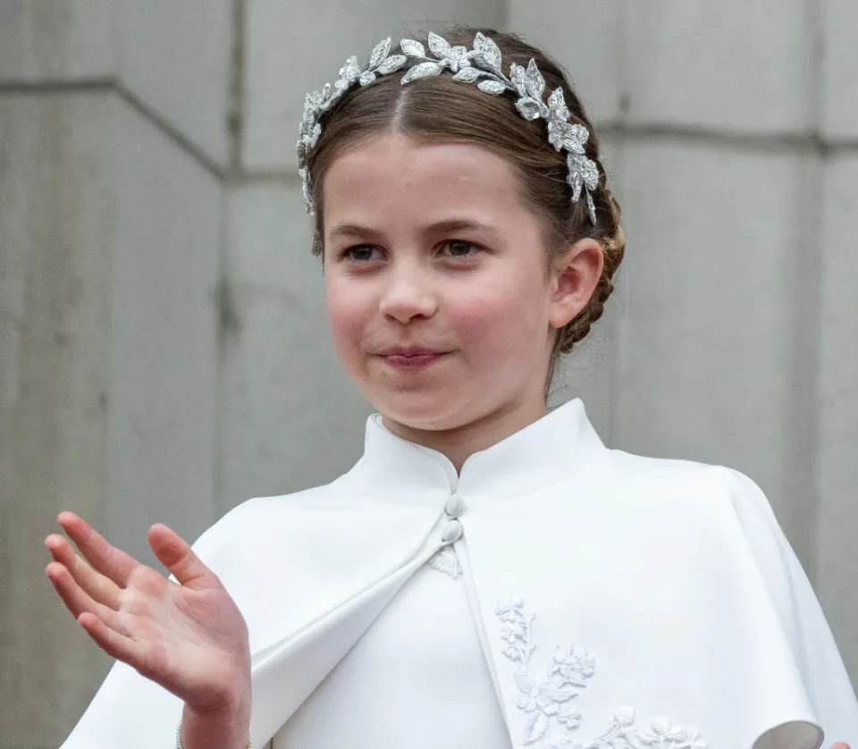 LONDON, ENGLAND - MAY 6: Princess Charlotte of Wales on the balcony of Buckingham Palace during the Coronation of King Charles III and Queen Camilla on May 6, 2023 in London, England. The Coronation of Charles III and his wife, Camilla, as King and Queen of the United Kingdom of Great Britain and Northern Ireland, and the other Commonwealth realms takes place at Westminster Abbey today. Charles acceded to the throne on 8 September 2022, upon the death of his mother, Elizabeth II. (Photo by UK Press Pool/UK Press via Getty Images)