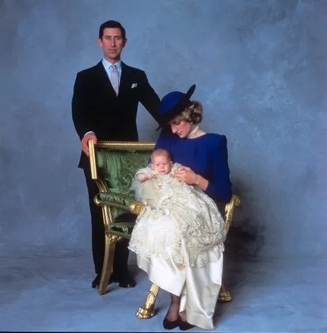 Getty Prince Charles, Princess Diana, and Prince Harry after Harry's christening