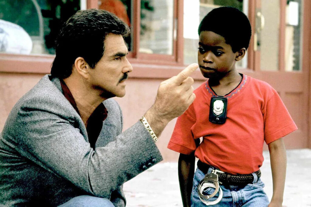 Former Child Actor From 1993's “Cop and a Half” Recalls 'Generous' Burt Reynolds Slipping Him $100's For Stunts (Exclusive)