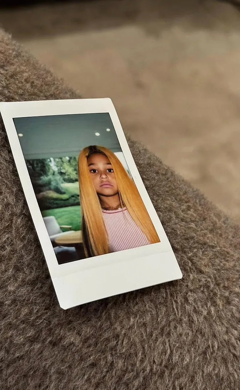 On Thursday, Kylie Jenner shared a Polaroid snapshot of daughter Stormi in her “King Kylie” orange wig. Kylie Jenner/Instagram
