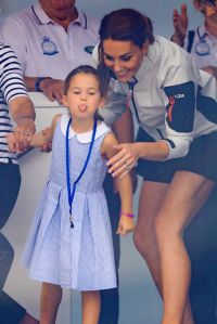 COWES, ENGLAND - AUGUST 08: Princess Charlotte of Cambridge and Catherine, Duchess of Cambridge having fun together after the inaugural King’s Cup regatta hosted by the Duke and Duchess of Cambridge on August 08, 2019 in Cowes, England. Their Royal Highnesses hope that The King’s Cup will become an annual event bringing greater awareness to the wider benefits of sport, whilst also raising support and funds for Action on Addiction, Place2Be, the Anna Freud National Centre for Children and Families, The Royal Foundation, Child Bereavement UK, Centrepoint, London’s Air Ambulance Charity and Tusk. (Photo by Chris Jackson/Getty Images)