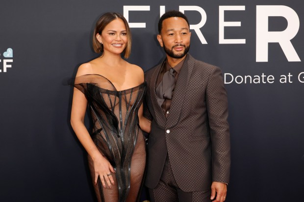 LOS ANGELES, CALIFORNIA - FEBRUARY 02: (FOR EDITORIAL USE ONLY) (L-R) Chrissy Teigen and John Legend attend the 67th GRAMMY Awards on February 02, 2025 in Los Angeles, California. (Photo by Frazer Harrison/Getty Images)