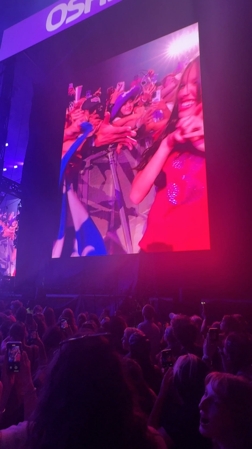 Olivia Rodrigo gifts fans her ‘GUTS’ rings during the final show of the GUTS era at Osheaga. She also seems to be teasing her third album with her '3' shirt