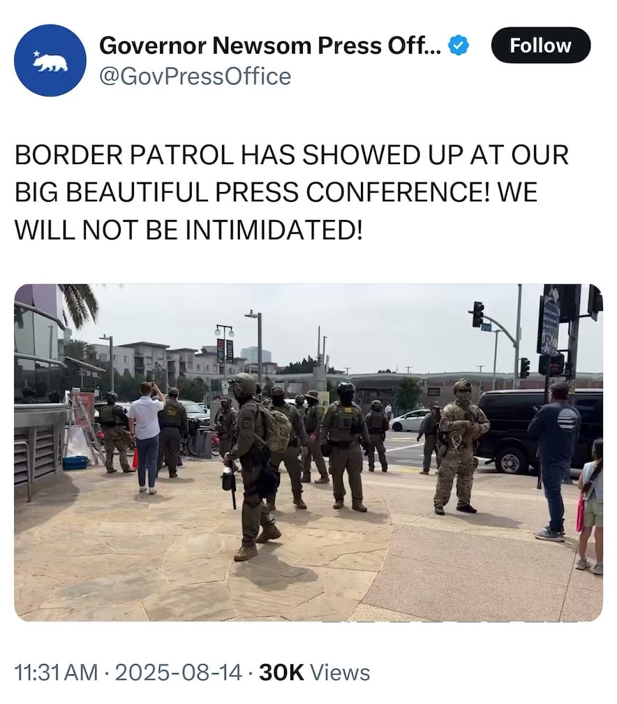 Armed Trump administration agents wearing masks just showed up outside of Gavin Newsom's press conference.