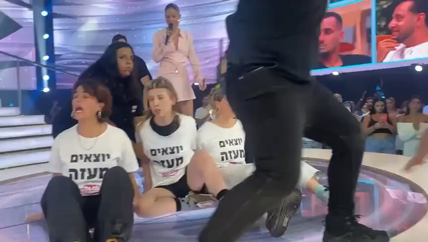 Israeli anti-war activists interrupt Israel's Big Brother show.
