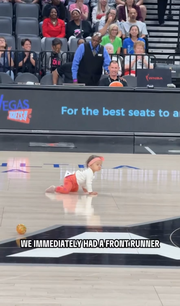 Baby decides to take her first steps to win baby race at Aces’ game