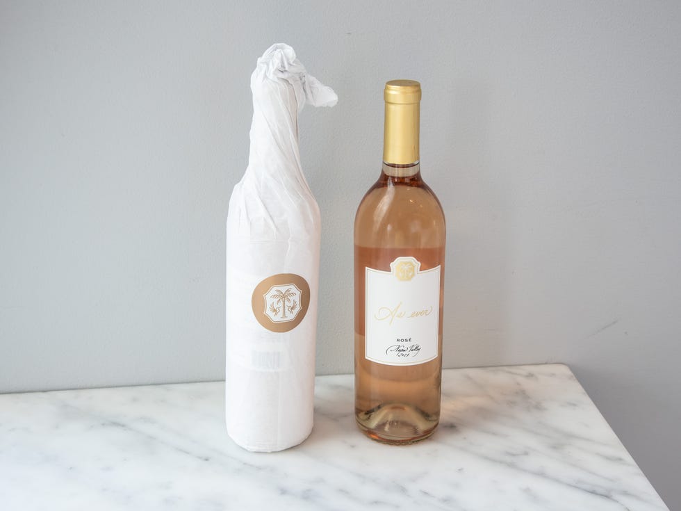 meghan markle as ever rose wine one wrapped and one unwrapped