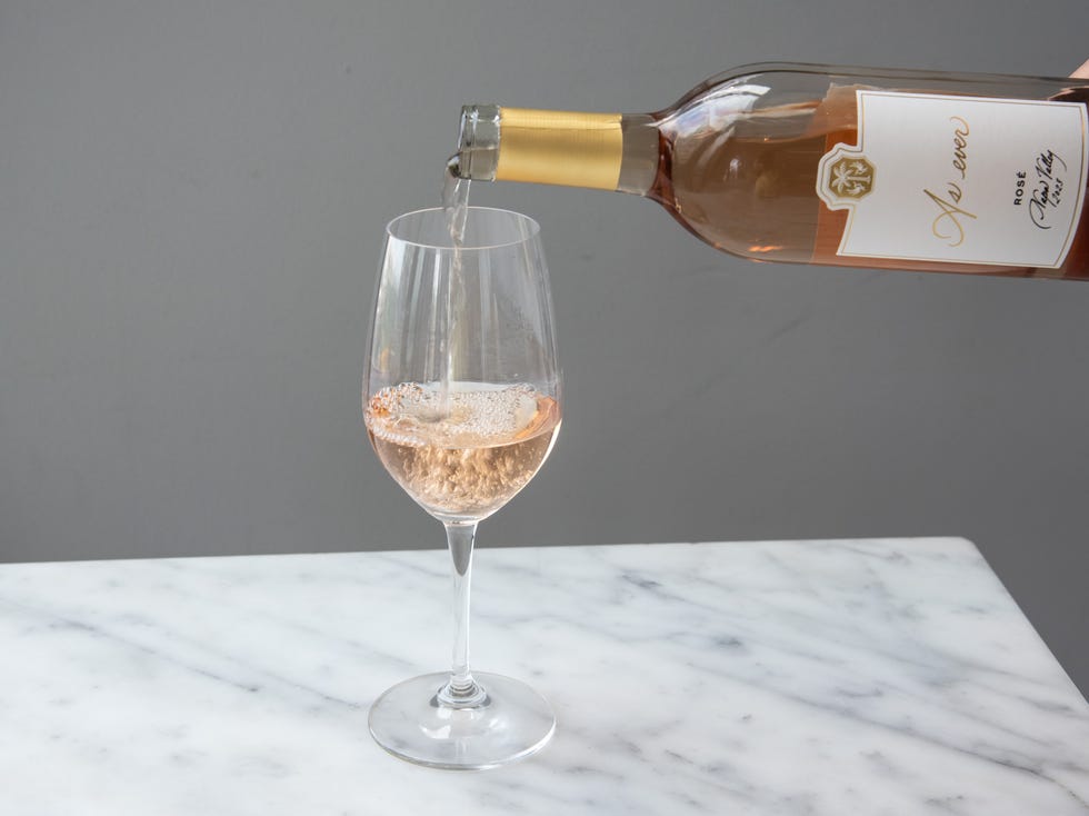 meghan markle as ever rose wine poured into a glass