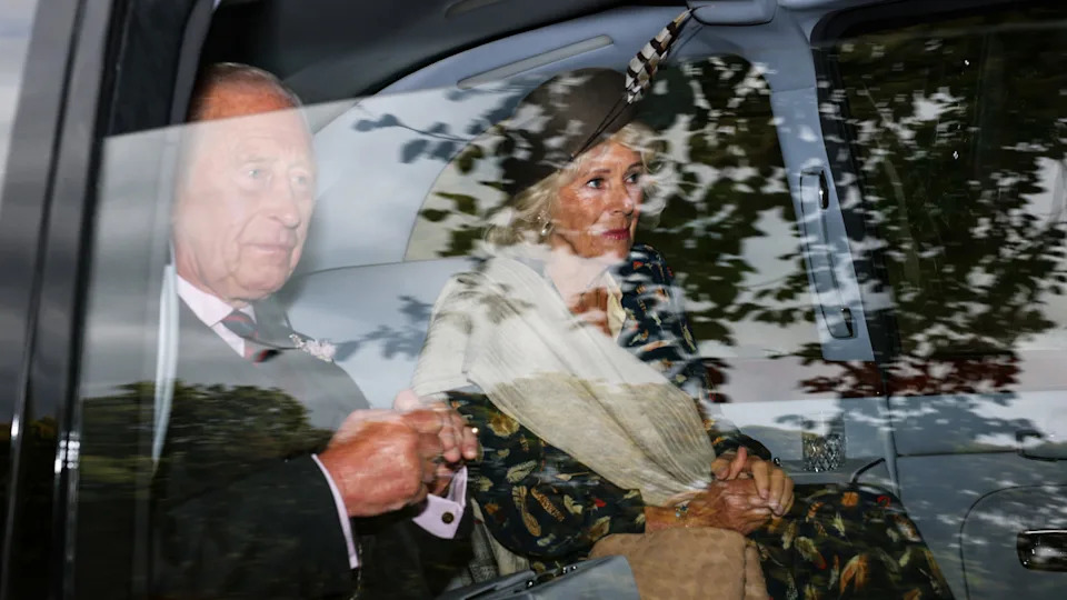 King Charles III and Queen Camilla arrive by car at Crathie Kirk to attend the church service at Crathie Kirk Church on Aug. 24 in Crathie, Aberdeenshire. (Photo by Jeff J Mitchell/Getty Images)