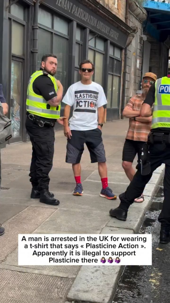 Man in UK getting arrested for wearing “Plasticine Action” shirt
