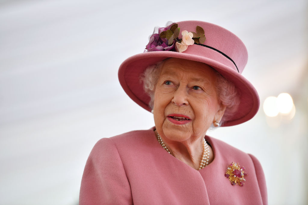 Queen Elizabeth’s Confidante Reveals Monarch Was ‘Hurt and Upset’ by Harry & Meghan’s Celebrity-Heavy Guest List Britain's Queen Elizabeth II