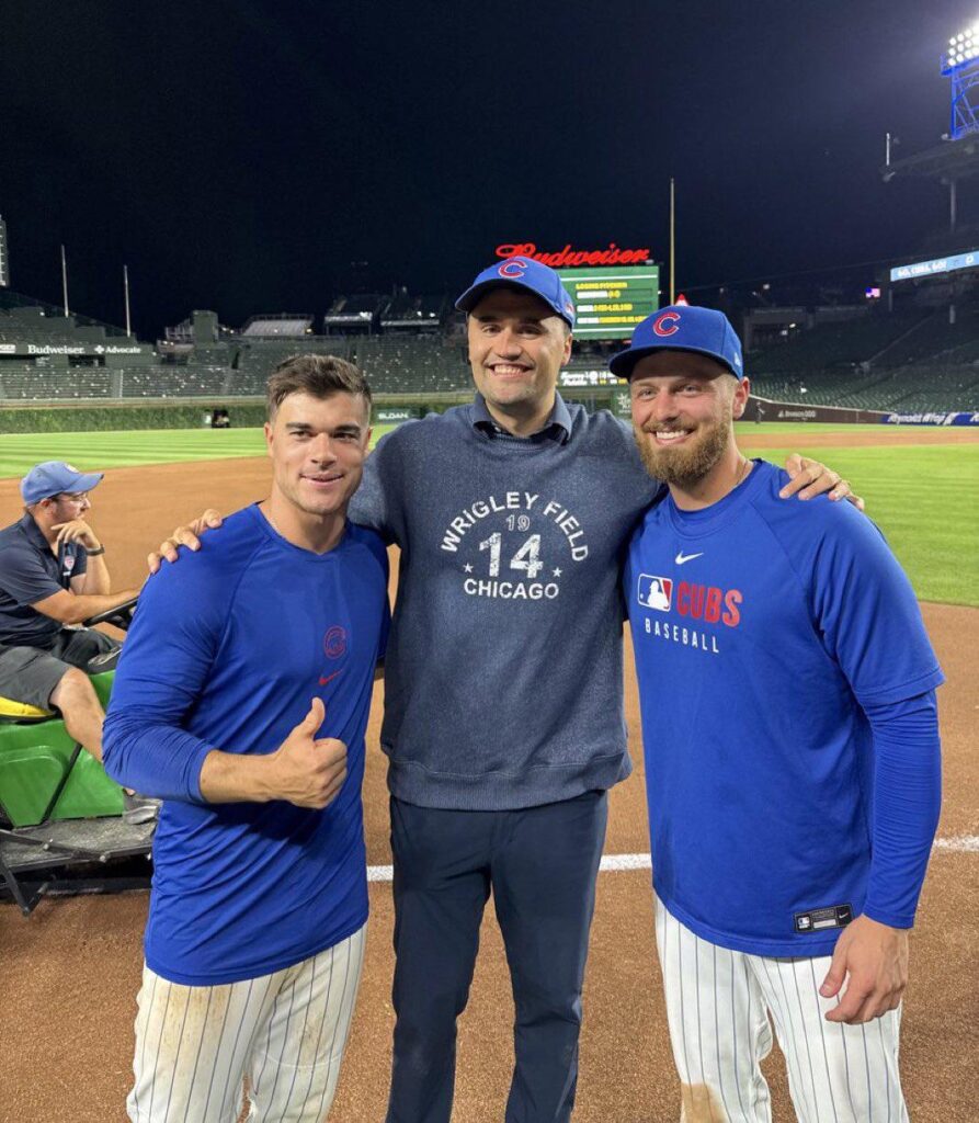 Chicago Cubs players Michael Busch and Matt Shaw pose with racist creep Charlie Kirk
