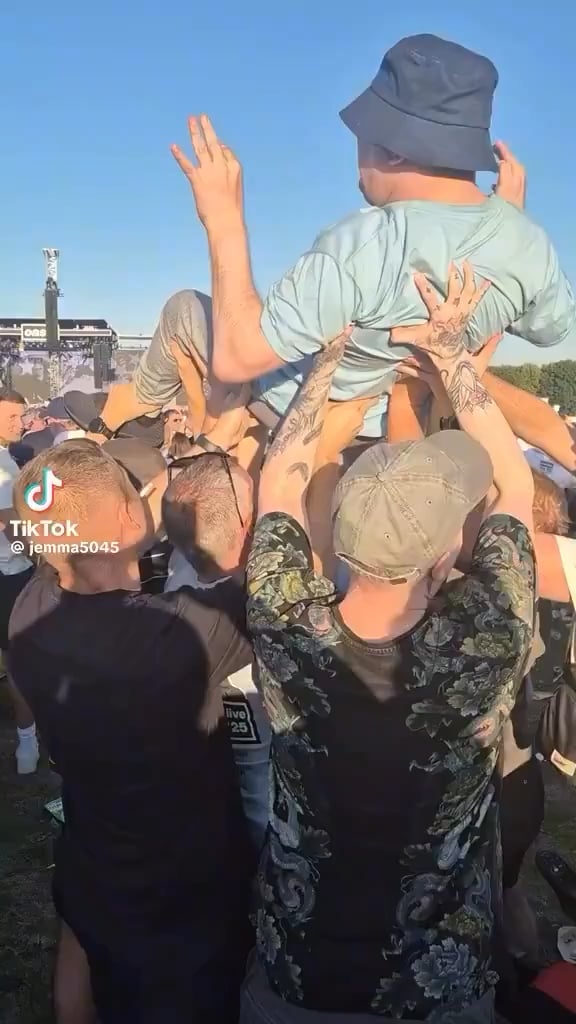 Fans at the Oasis Heaton Park performance lifted up a disabled fan so he could get a better view