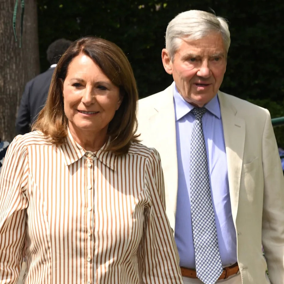  Carole and Michael Middleton walking together at Wimbledon. 