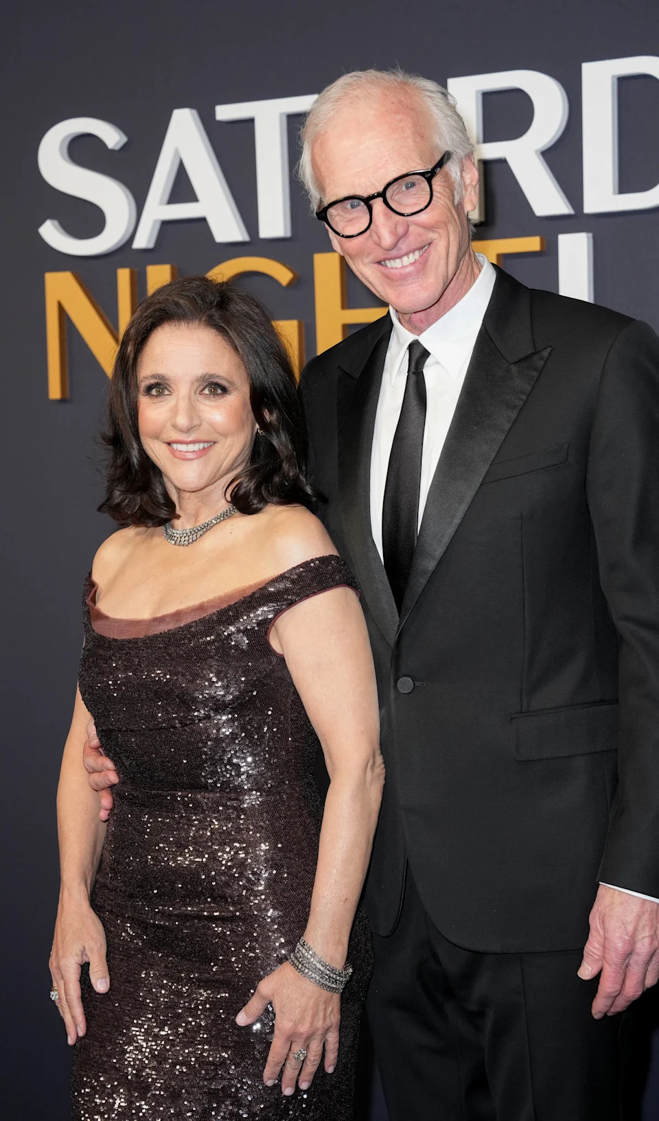 Julia Louis-Dreyfus and Brad Hall at an event