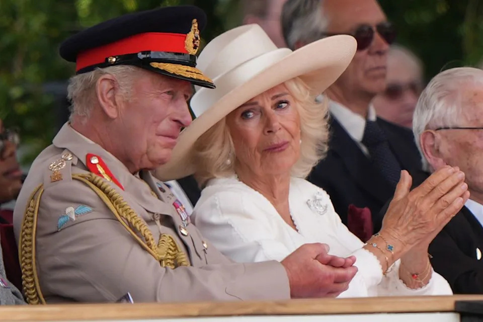 alrewas, staffordshire august 15: king charles iii and queen camilla during the national service of remembrance, hosted by the royal british legion in partnership with the government, to mark the 80th anniversary of vj day at the national memorial arboretum on august 15, 2025 in alrewas, staffordshire. the service commemorates the 80th anniversary of victory over japan day, or vj day, which marks the announcement of japans acceptance of the terms of the potsdam declaration on august 15, 1945, effectively bringing wwii to an end. (photo by joe giddens wpa pool/getty images)