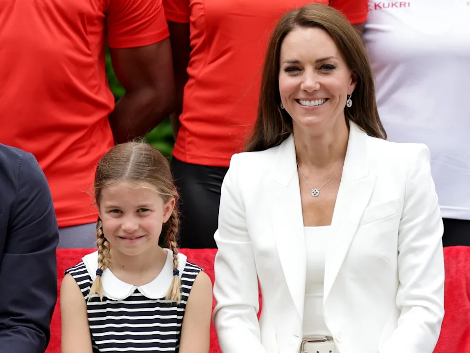 BIRMINGHAM, ENGLAND - AUGUST 02: Prince William, Duke of Cambridge, Catherine, Duchess of Cambridge and Princess Charlotte of Cambridge pose for a photograph as they visit Sportsid House at the 2022 Commonwealth Games on August 02, 2022 in Birmingham, England. The Duchess became the Patron of SportsAid in 2013, Team England Futures programme is a partnership between SportsAid, Sport England and Commonwealth Games England which will see around 1,000 talented young athletes and aspiring support staff given the opportunity to attend the Games and take a first-hand look behind-the-scenes.
