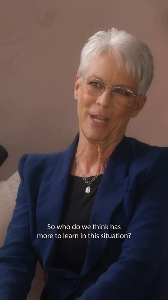 Jamie Lee Curtis in a blue blazer, asking a question.