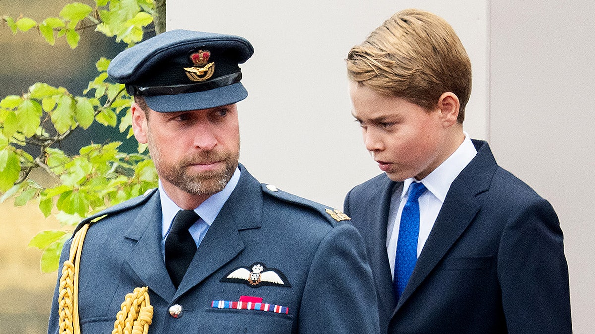 Prince William and Prince George standing together at VE Day