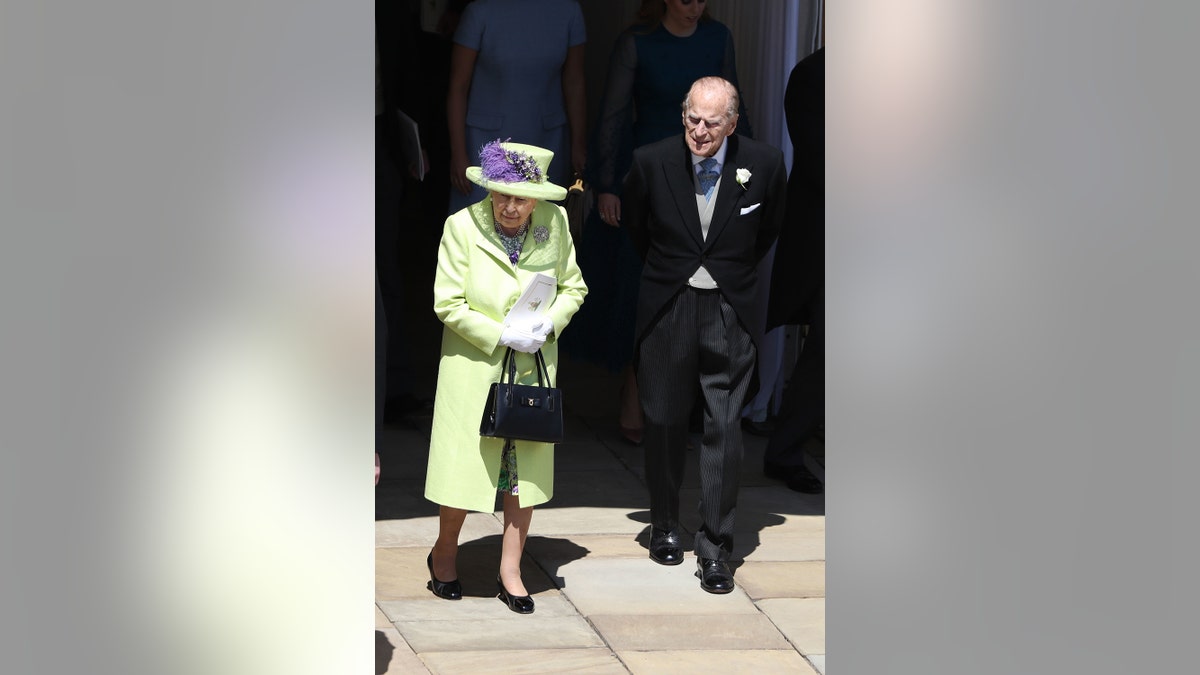 Prince Philip and Queen Elizabeth walking out of St George's Chape after Meghan Markle and Prince Harry's wedding ceremony.
