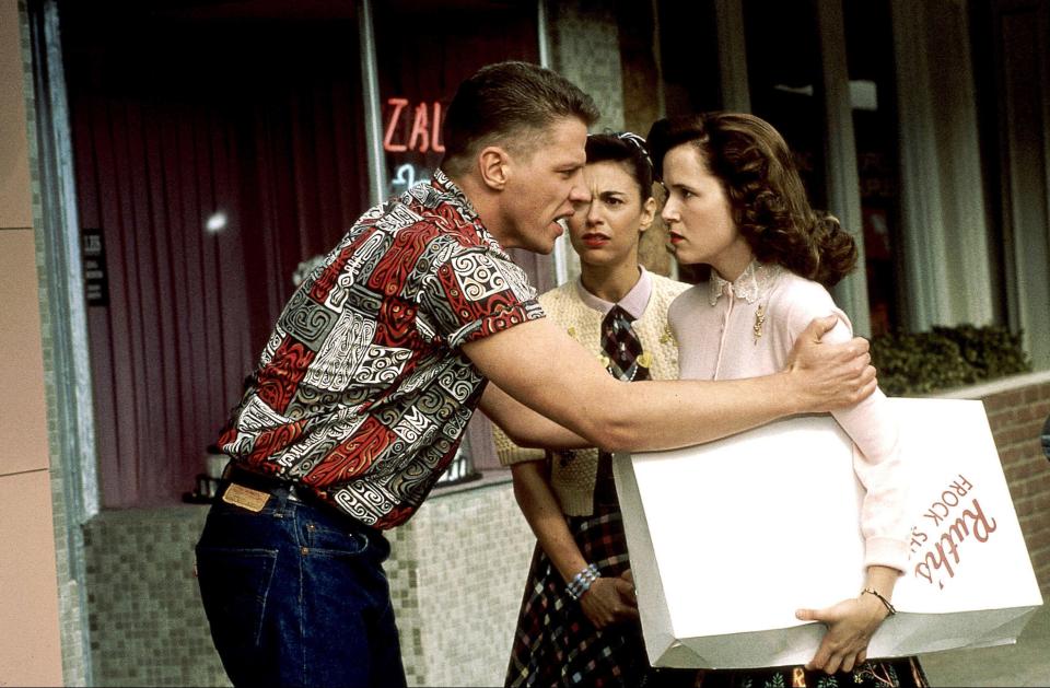 Scene from Back to the Future Part II: Thomas F. Wilson, Lea Thompson, and another woman.
