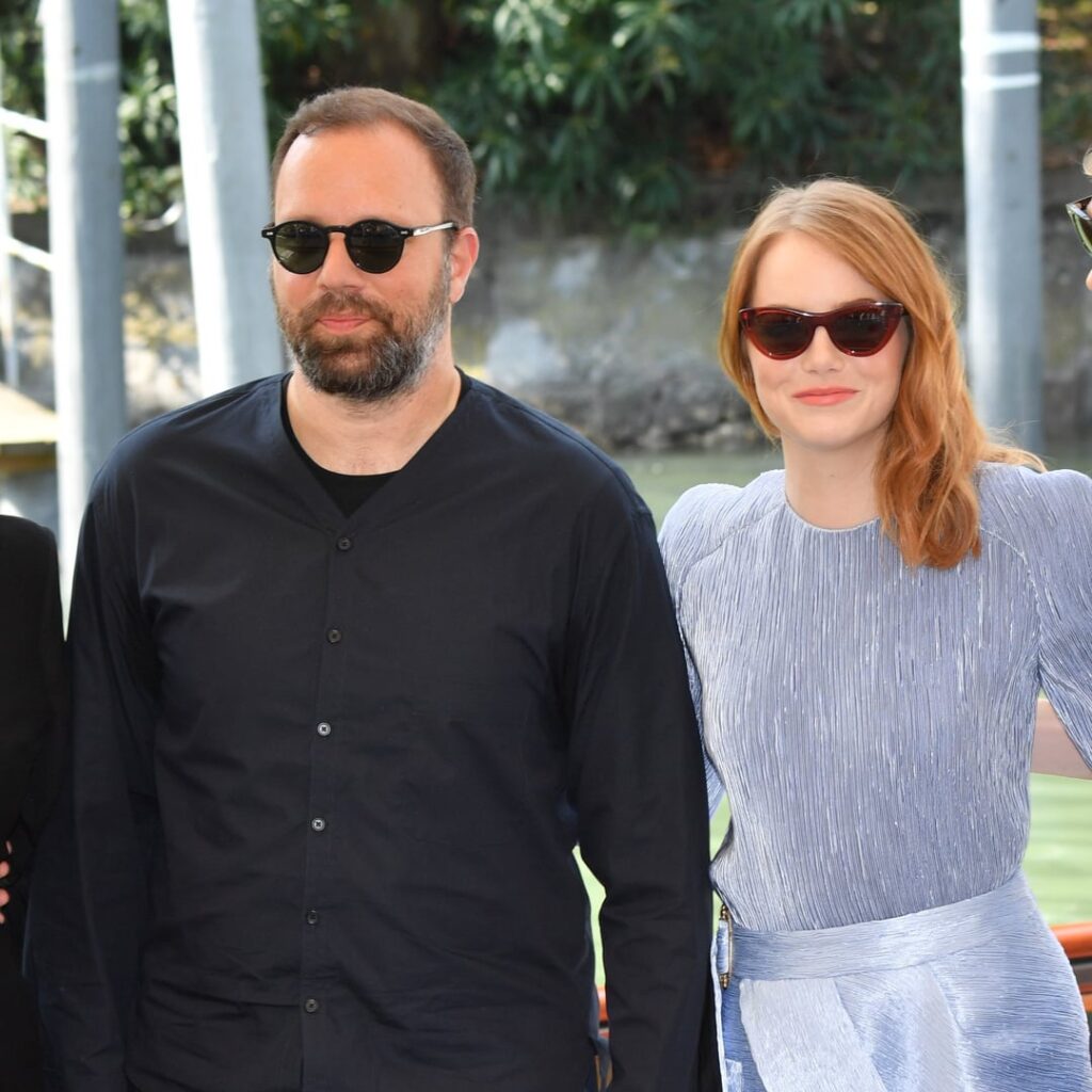 Yorgos Lanthimos and Emma Stone arriving at their first Venice for "The Favourite" and for their 5th collab "Bugonia"