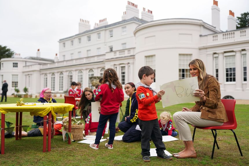 US first lady Melania Trump and Catherine, Princess of Wales speak with members of the Scouts' Squirrels program in the grounds of Frogmore Cottage in Windsor, England,  on September 18, 2025.