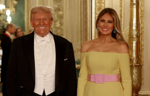 US President Donald Trump and US First Lady Melania Trump pose for a photo as they attend a State Banquet at Windsor Castle, in Windsor, on September 17, 2025, during the US President's second State Visit. US President Donald Trump arrived in Britain for an unprecedented second State Visit, with the UK government rolling out a royal red carpet welcome to win over the mercurial leader. (Photo by Phil Noble / POOL / AFP) (Photo by PHIL NOBLE/POOL/AFP via Getty Images)
