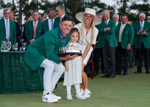 Rory McIlroy and Erica Stoll with their daughter Poppy after Rory's Masters triumph