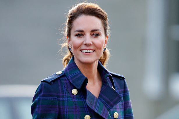 Kate Middleton in blue jacket outdoors