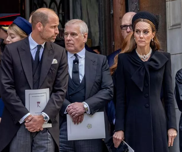 Prince Andrew was photographed trying to talk to Prince William at the funeral