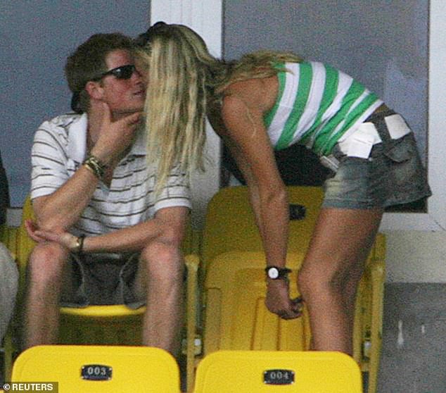 Harry kisses Chelsy at  a cricket match. The kiss was seen to break royal protocol