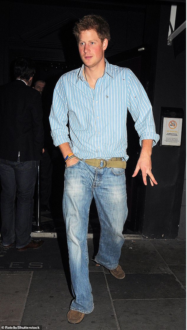 Harry leaving Raffles nightclub in London in 2009. Harry's outings to bars and clubs were of keen interest to the press at the time