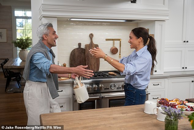 Meghan with designer Tan France on the latest season of With Love, Meghan