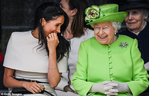 The Queen and Meghan during a ceremony to open the Mersey Gateway Bridge in 2018. It was Meghan's first public engagement