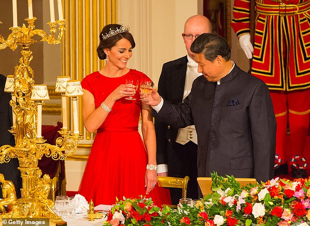 Kate Middleton and Chinese President Xi Jinping are pictured at a state banquet at Buckingham Palace on October 20, 2015