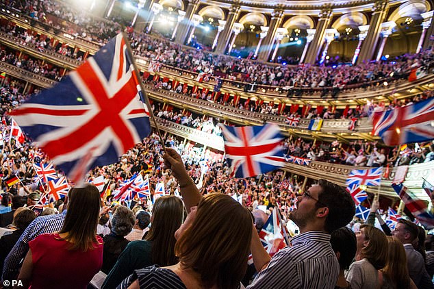 The audience at the Last Night of the Proms wave their Union flags at the Royal Albert Hall in London