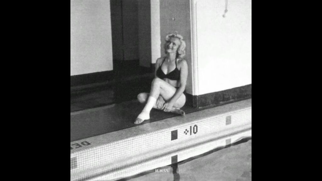 Marilyn Monroe on crutches at a pool in Canada. Badly sprained ankle. Location filming “River” 1953 Marilyn Monroe on crutches at a pool in Canada. Badly sprained ankle. Location filming "River" 1953