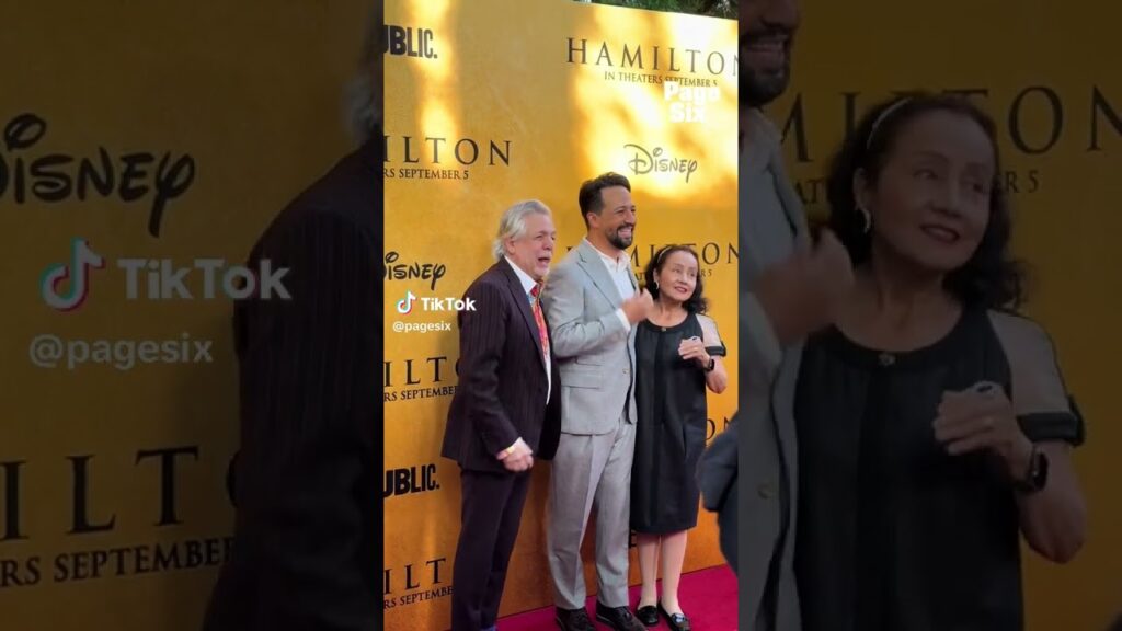 Lin-Manuel Miranda poses with his parents at the theatrical premiere of 'Hamilton' 🥹 #shorts