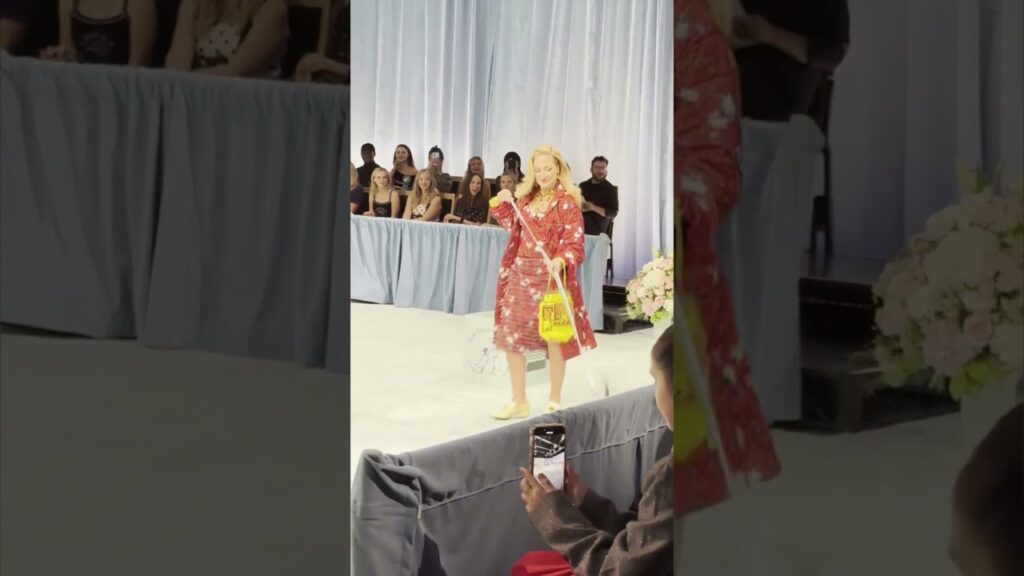 Edie Falco walks with perfect pup at canine fashion show #shorts