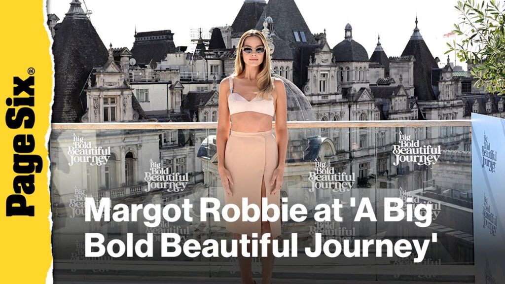 Margot Robbie wears vintage nude bra & skirt set for A Big Bold Beautiful Journey London photo call