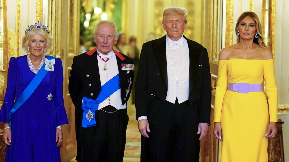 WINDSOR, ENGLAND - SEPTEMBER 17: U.S. President Donald Trump, (2nd R) First Lady Melania Trump, (R) King Charles III and Queen Camilla (L) arrive for the State Banquet hosted by King Charles III and members of the Royal Family at Windsor Castle during the state visit by the President of the United States of America on September 17, 2025 in Windsor, England. President Trump is in England from Sept. 16-18 on his second UK state visit, with the previous one taking place in 2019 during his first presidential term. (Photo by Aaron Chown-WPA Pool/Getty Images)
