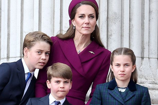 Prince George of Wales, Prince Louis of Wales, Catherine, Princess of Wales and Princess Charlotte of Wales on the balcony of Buckingham Palac